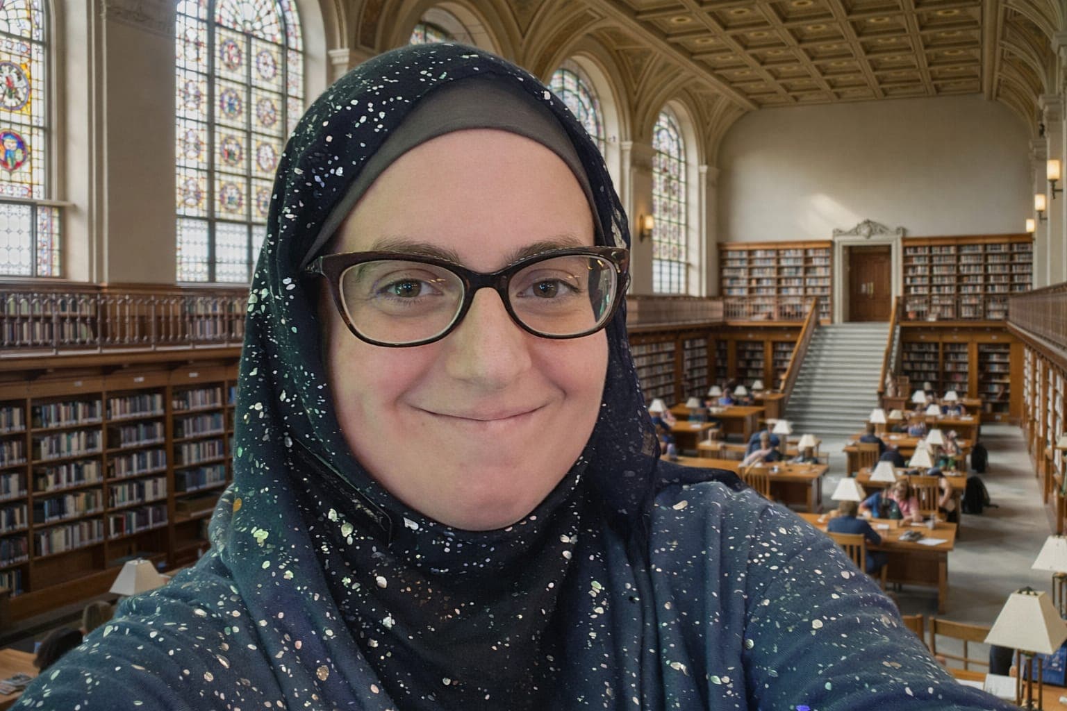 Dr. Jeannine Sherman, seated in a university reading room